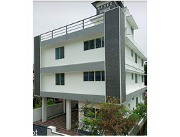 ERNAKULAM ,KAKKANADU - KOLLAMKUDIMUGAL 6.5 cent land with 5000 sqft G+2 Hostel Building for Sale