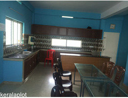 ERNAKULAM ,KAKKANADU - KOLLAMKUDIMUGAL 6.5 cent land with 5000 sqft G+2 Hostel Building for Sale