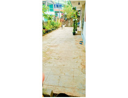 15 cent ലാർജ് road frontage land with  1300sq ft 8 years old house in beautiful residential