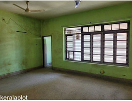 13.5 cent  land with 2 storey old house at South Metro Station Kalathiparambil road