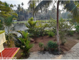 11 cent land with 950 sqft water frontage house sale near by Gothuruthu St Sebastine Church