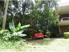 39cents land with 3900 sqft two storied house by state highway in Shoranur, PALAKKAD